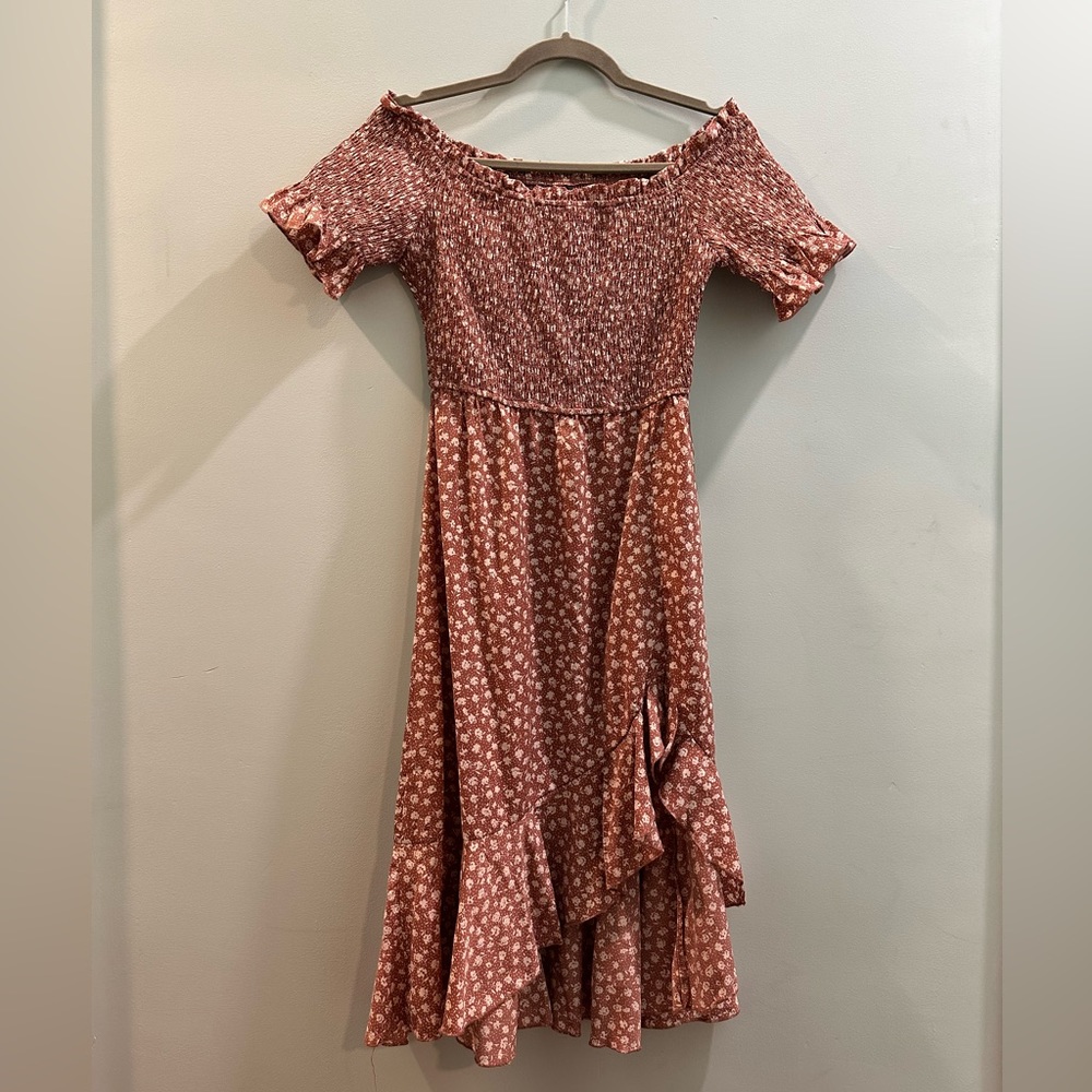 Cutest off the shoulder peasant dress with a ruffle slit!
